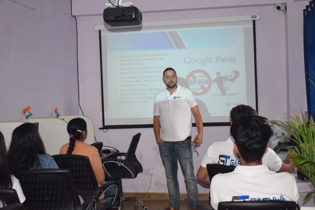 A man delivers a presentation to students at Gashwa Institute of Technical Education Private Limited during a training session.